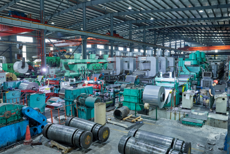 Multiple rolling and annealing lines in operation, enabling continuous stainless steel coil heat treatment at AKS facility.