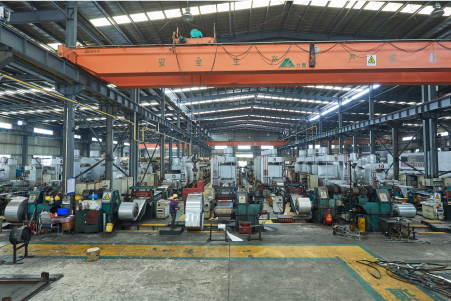 High-volume processing and coil storage area within AKS facility, connected to bright annealing and cutting equipment.