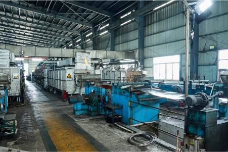 Full view of bright annealing coil line inside AKS plant, supporting stainless steel strip continuous processing.