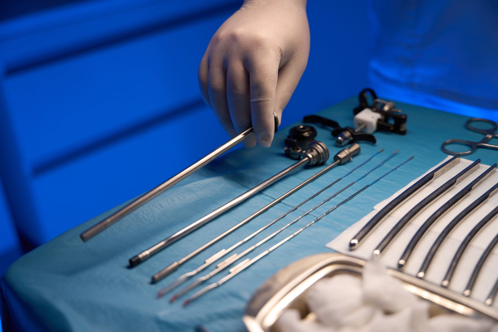 Sterile stainless steel surgical tools arranged for precision operations, highlighting medical-grade manufacturing applications.